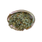 Grade A prehnite crystal chips in a bowl, sourced from Namibia