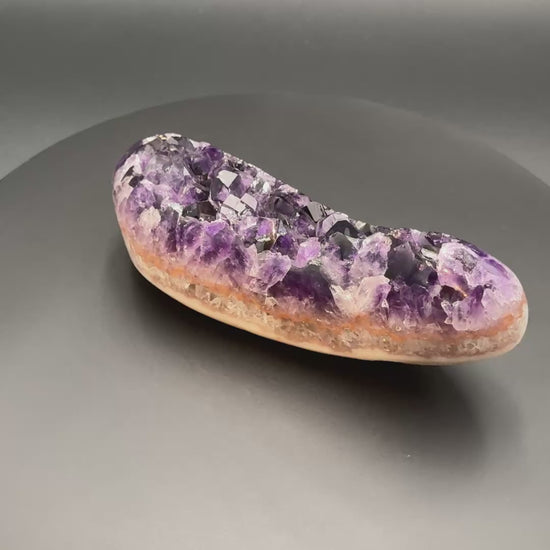 Video of the AAA grade amethyst polished geode from Artigas, Uruguay, 6.89 x 2.18 x 2.60 in, 2.16 pounds, specimen 6.