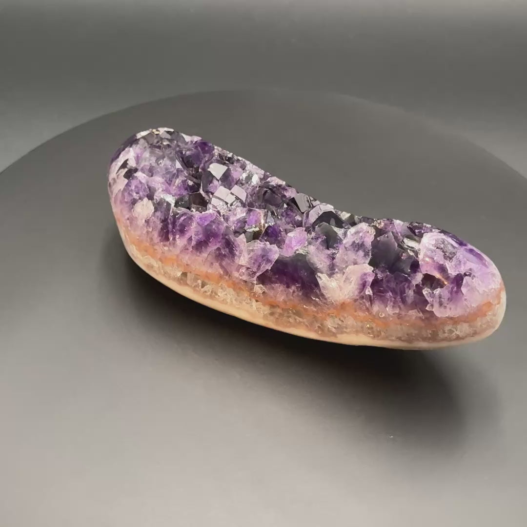 Video of the AAA grade amethyst polished geode from Artigas, Uruguay, 6.89 x 2.18 x 2.60 in, 2.16 pounds, specimen 6.