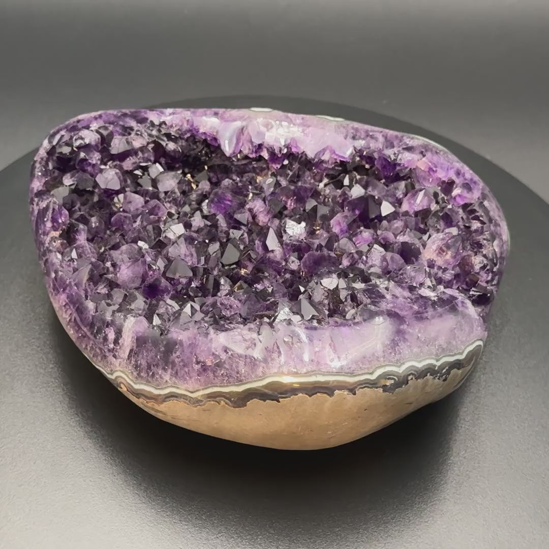 Video of the AAA grade amethyst polished geode from Artigas, Uruguay, 7.59 x 5.89 x 2.28 in, 5.66 pounds, specimen 24.