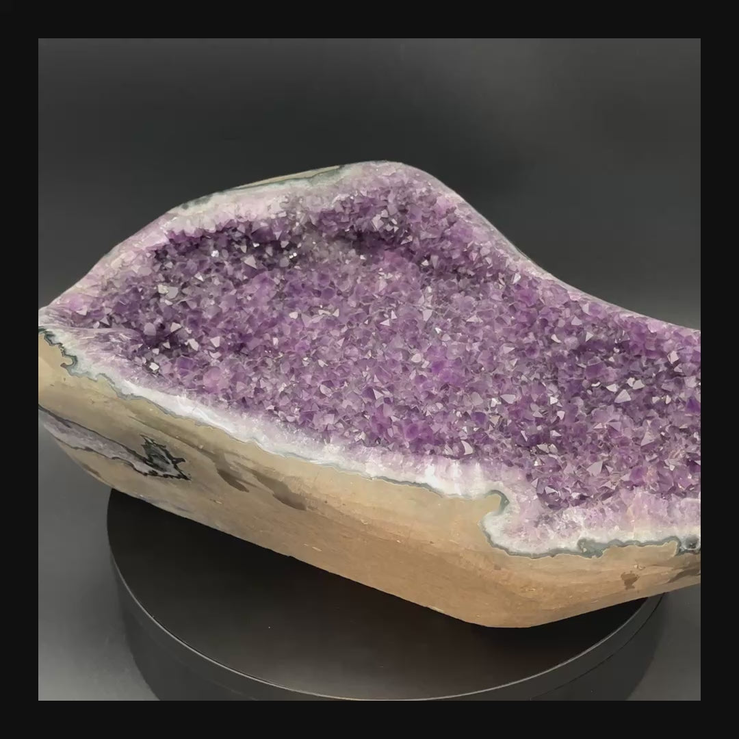 Video of the AAA grade amethyst polished geode from Artigas, Uruguay, 15.22 x 5.36 x 5.36 in, 23.88 pounds.