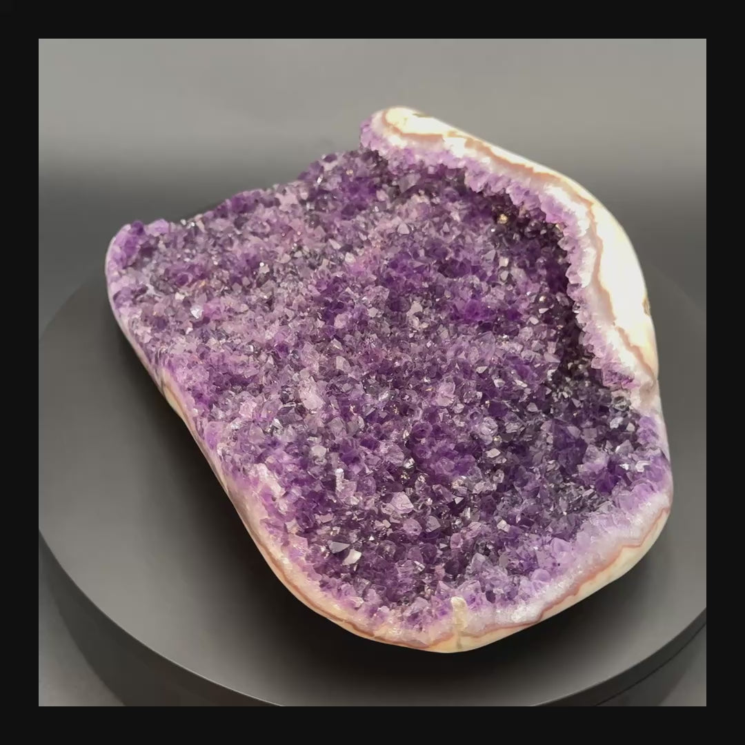 Video of the AA grade amethyst polished geode from Artigas, Uruguay, 10.03 x 7.61 x 2.09 in, 7.21 pounds, specimen 23.