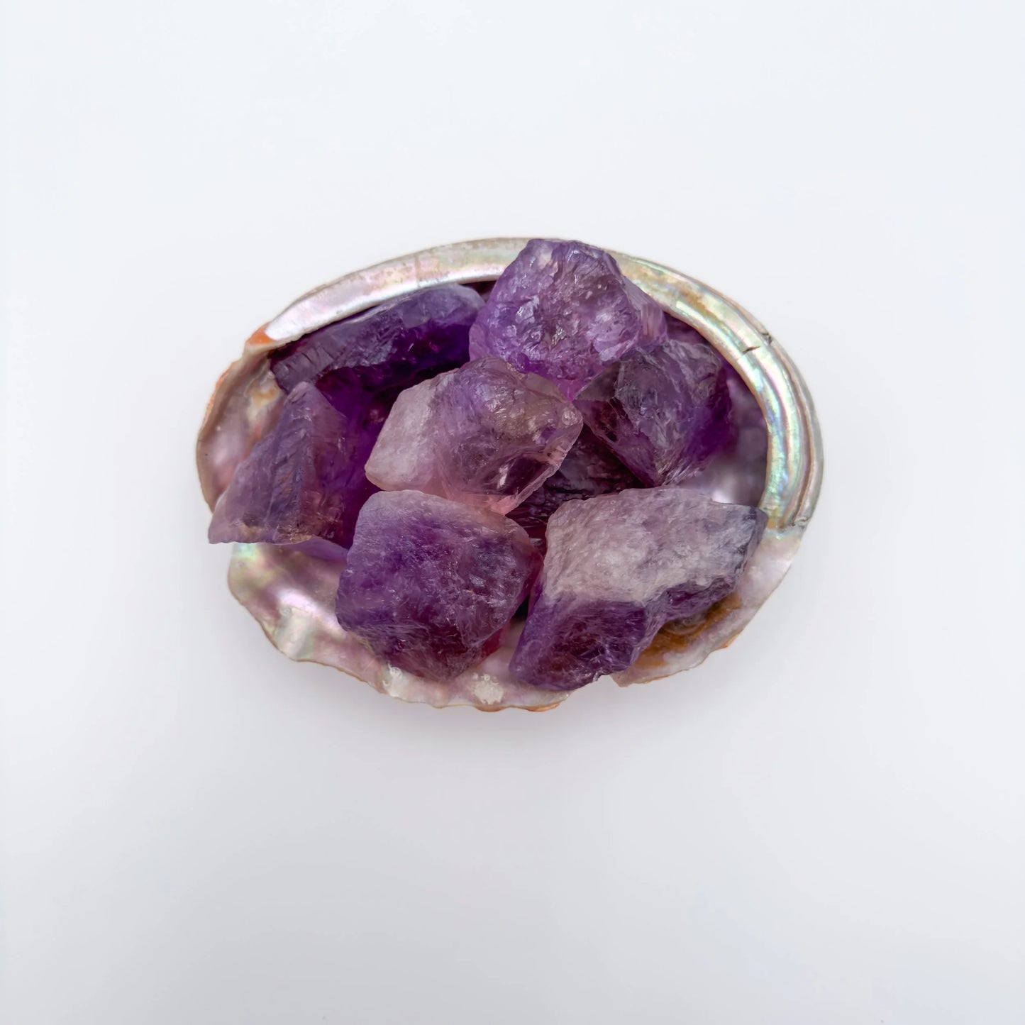 Lateral view of Ametrine raw stone, sourced from Ángel Sandoval Province, Bolivia, showing characteristic patterning.