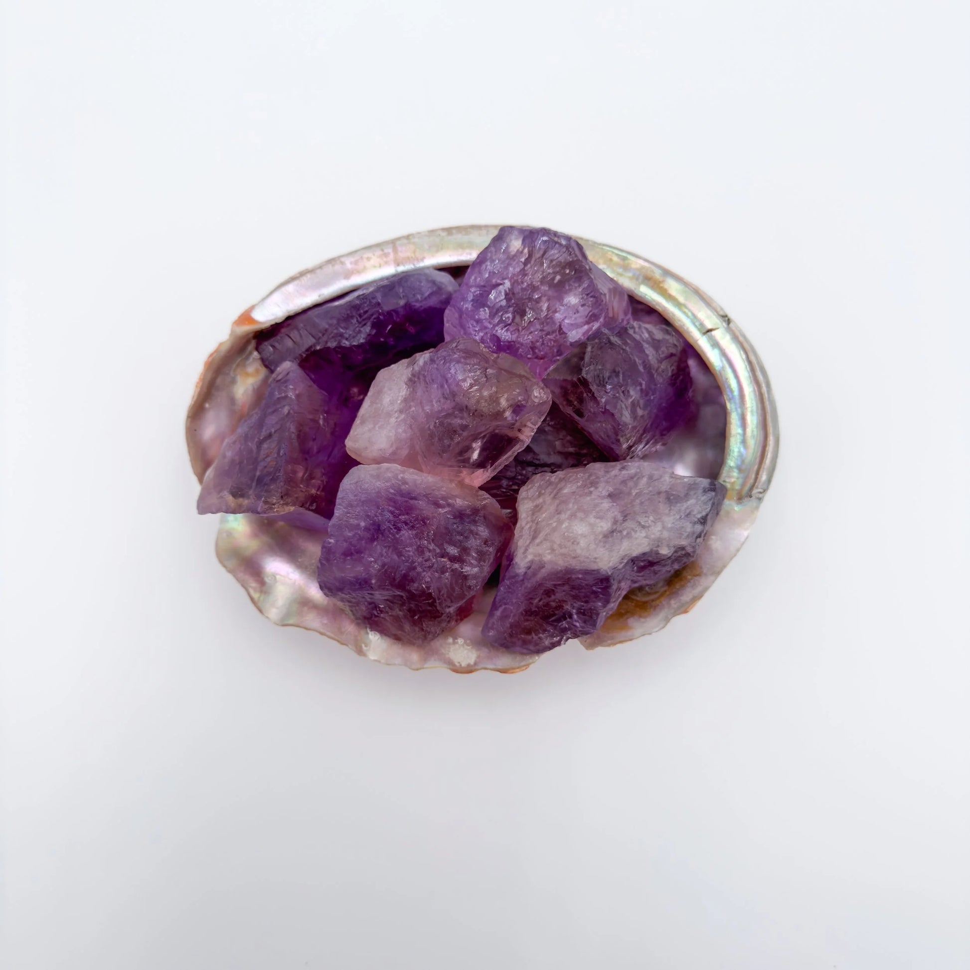 Lateral view of Ametrine raw stone, sourced from Ángel Sandoval Province, Bolivia, showing characteristic patterning.