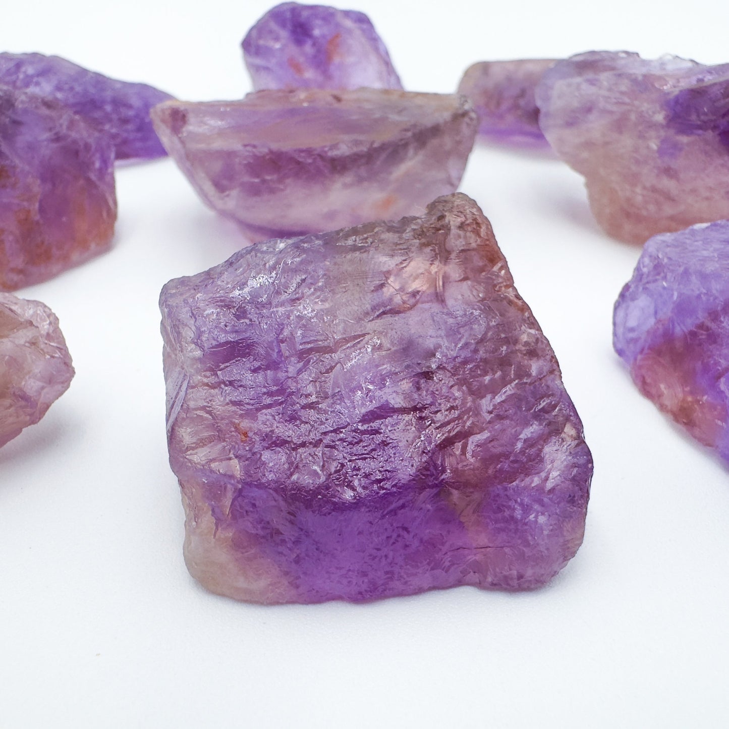 Overhead view of Ametrine raw stone, showing untreated character, to support Focus and Manifestation.