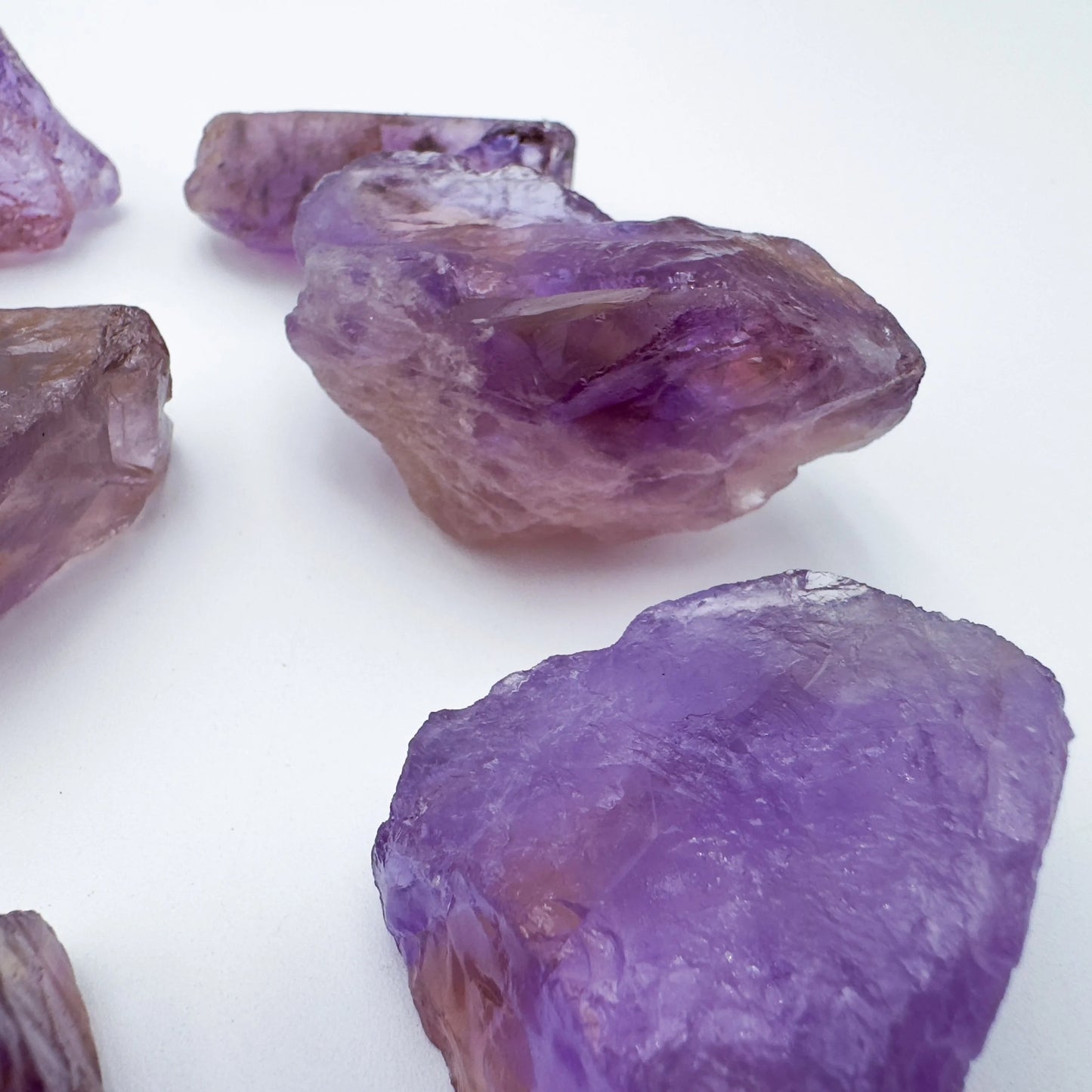 Lifestyle view of a Ametrine raw stone, from Bolivia.