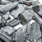 Alternate angle of Grade AA Black Tourmaline raw showing overall shape