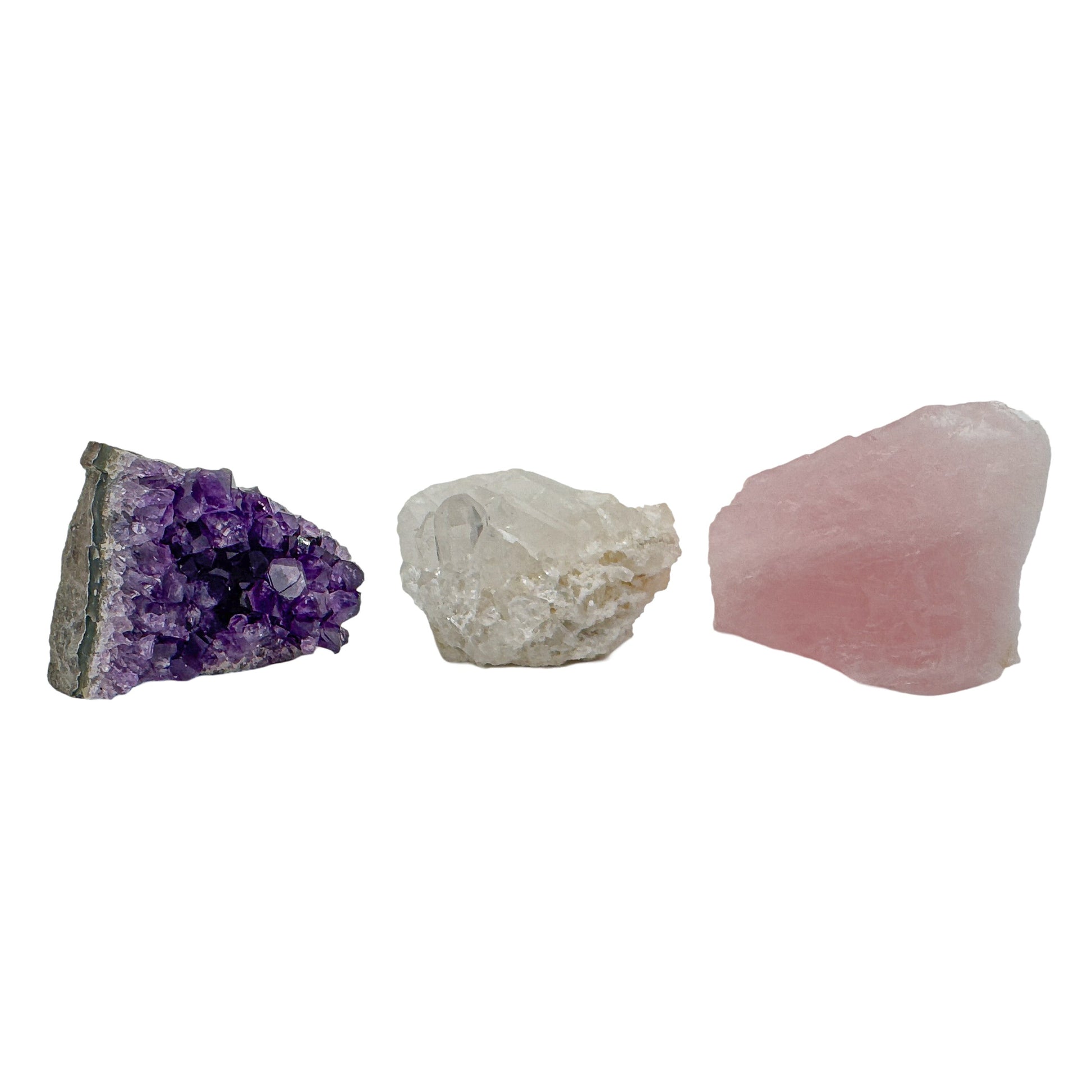 Amethyst, clear quartz and rose quartz from the raw crystal set arranged side by side