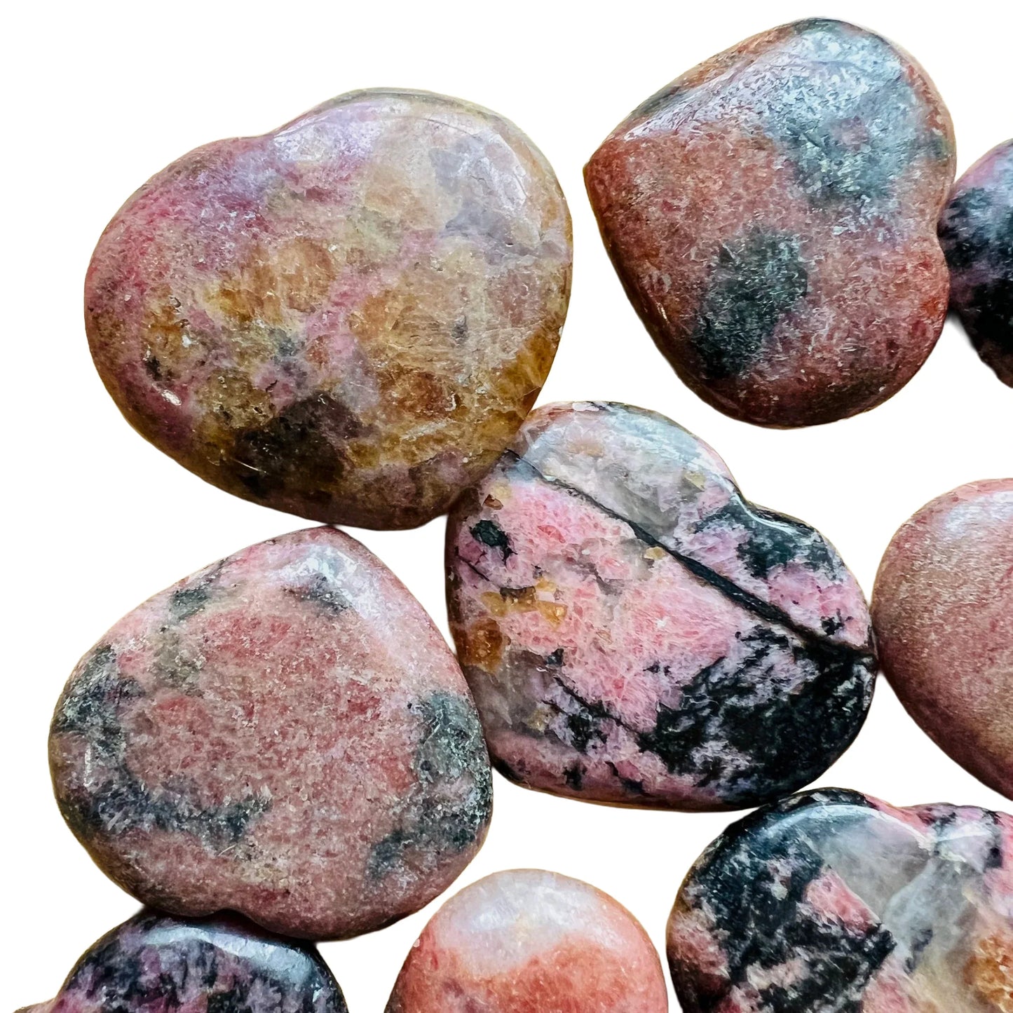 Back view of Rhodonite polished heart, showing natural sheen.