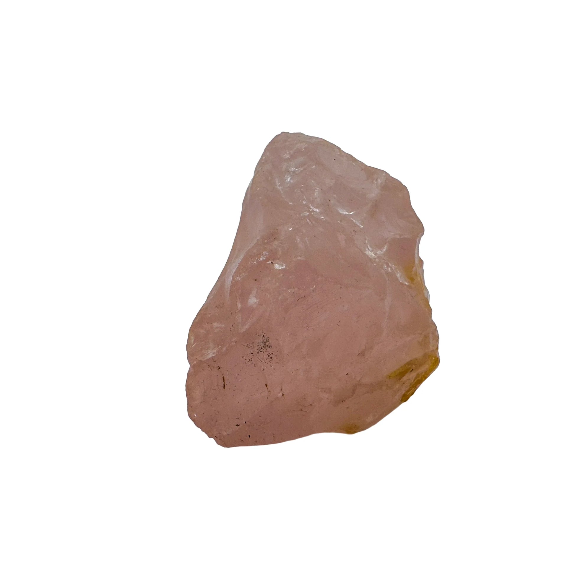 Styled with natural light Rose Quartz specimen, associated with Stress Relief, shown in its everyday setting.