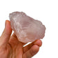 Detail shot of Grade AAA Rose Quartz specimen under natural light