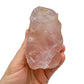Detail shot of Grade AAA Rose Quartz specimen under natural light