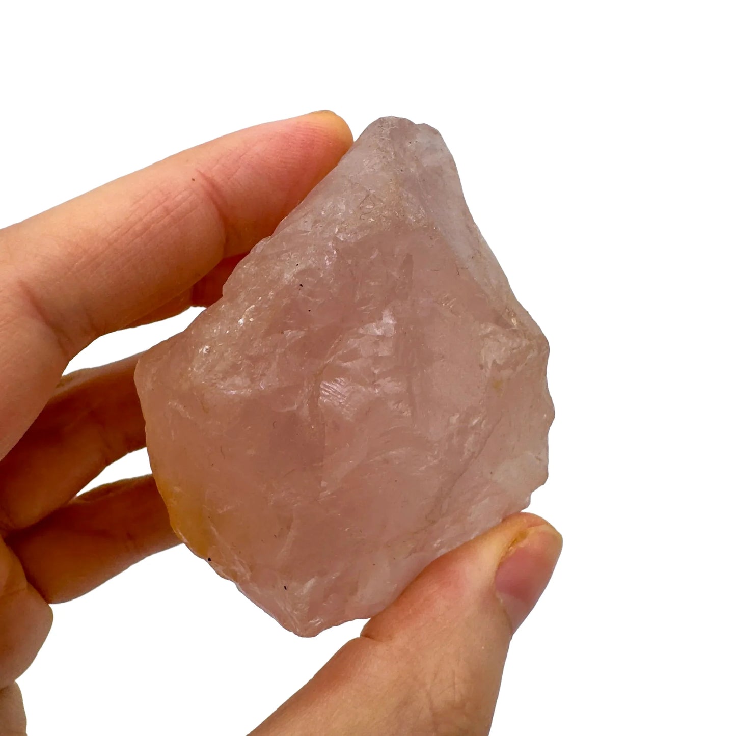 Detail shot of Grade AAA Rose Quartz specimen under natural light