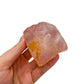 Back view of Grade AA Rose Quartz specimen showing natural surface