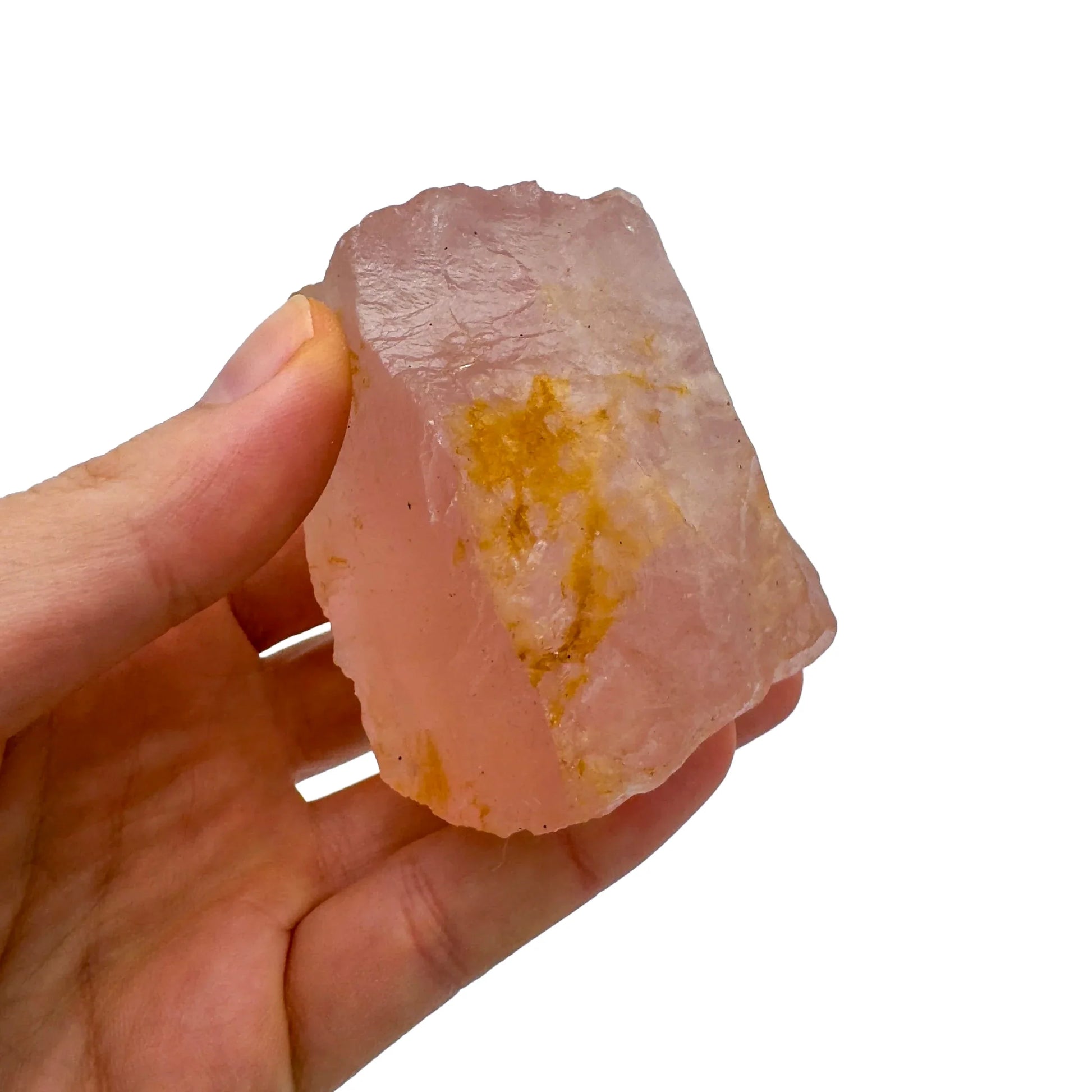 Detail shot of Grade AA Rose Quartz specimen under natural light