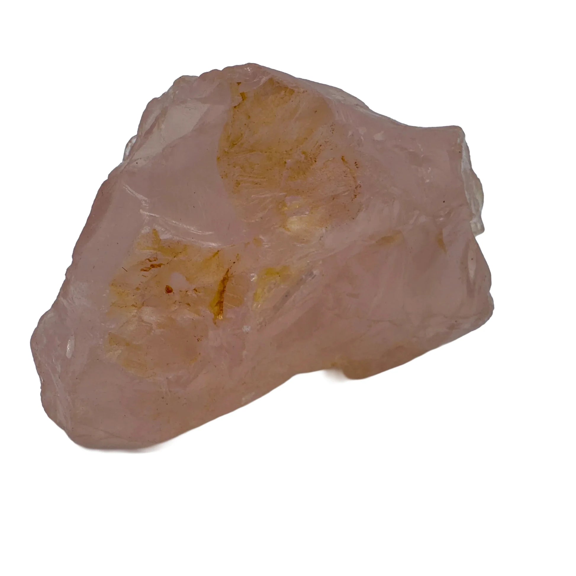 Considered view of Rose Quartz specimen, from Alaotra-Mangoro, Madagascar, set against a soft neutral surface.