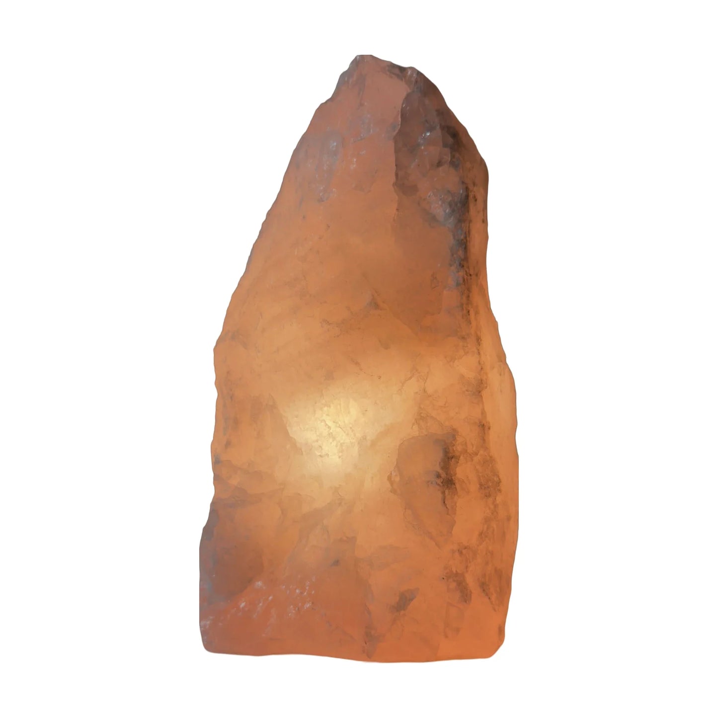 Rose quartz crystal lamp lit, warm pink glow, additional view