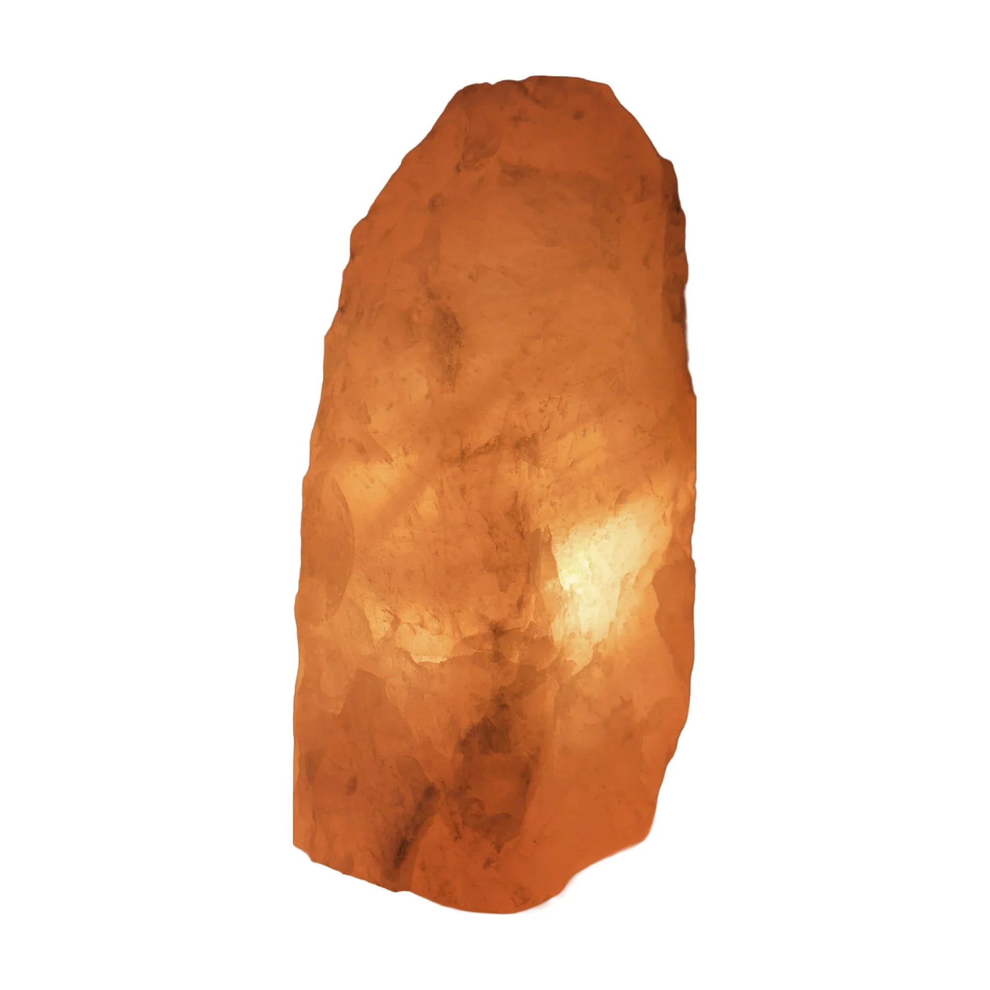 Rose quartz crystal lamp lit, deeper warm glow through the stone