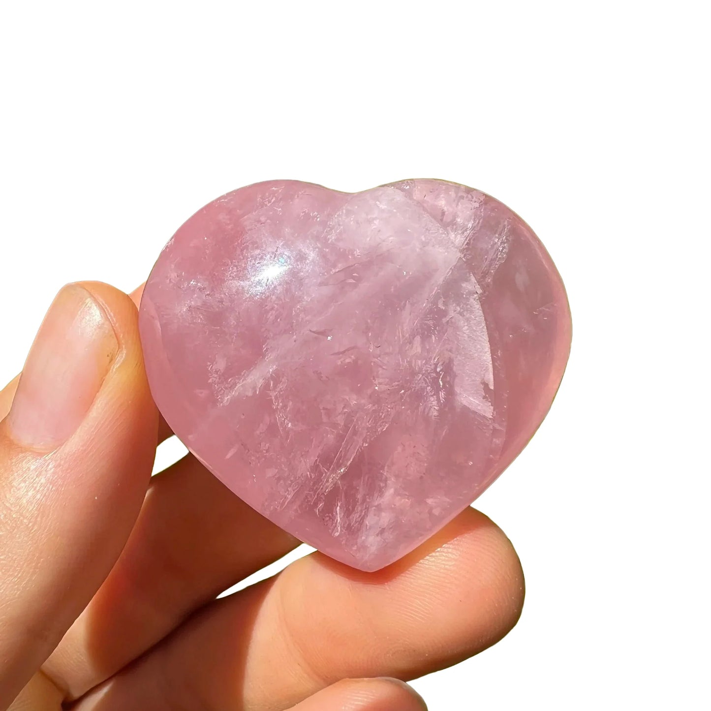 Surface detail of Rose Quartz polished heart, sourced from Vakinankaratra, Madagascar.