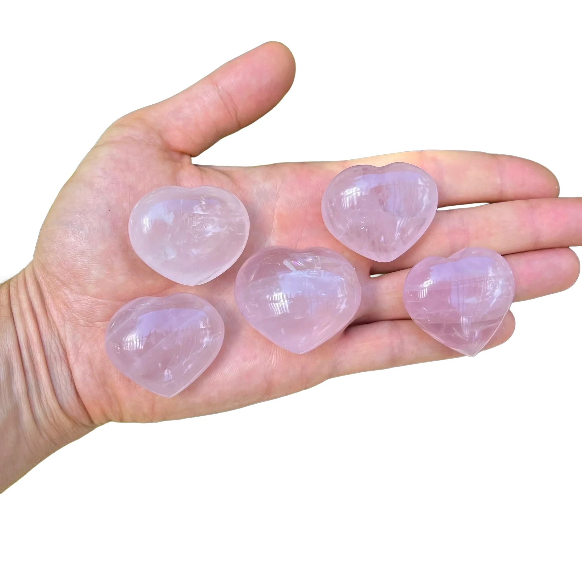 Back view of Grade AA Rose Quartz heart showing natural surface