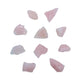 Flat lay of eleven Rose Quartz pieces spaced evenly on white, each hand-graded to AA before it ships from Beyond Bohemian.