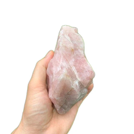 Side profile of Rose Quartz specimen, hand-selected from Alaotra-Mangoro, Madagascar, showing natural texture.