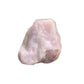 Natural light view of a Rose Quartz specimen held against natural backdrop, hand-selected from Alaotra-Mangoro, Madagascar.