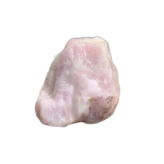 Natural light view of a Rose Quartz specimen held against natural backdrop, hand-selected from Alaotra-Mangoro, Madagascar.