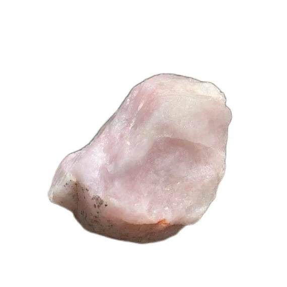 Detail shot of Grade AA Rose Quartz specimen under natural light