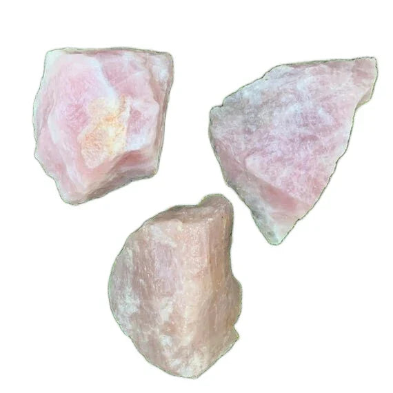 Underside view of Rose Quartz raw stone, linked to Love, showing subtle veining.