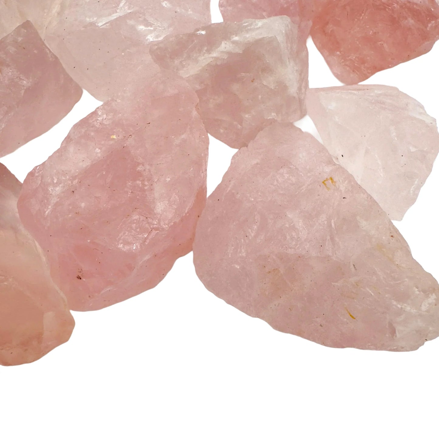 Edge view of Rose Quartz raw stone, showing natural sheen, associated with Love and Self Love.