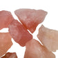 Wider context of Rose Quartz raw crystal, from Erongo, Namibia, associated with Emotional Healing, in the warmth of daylight.