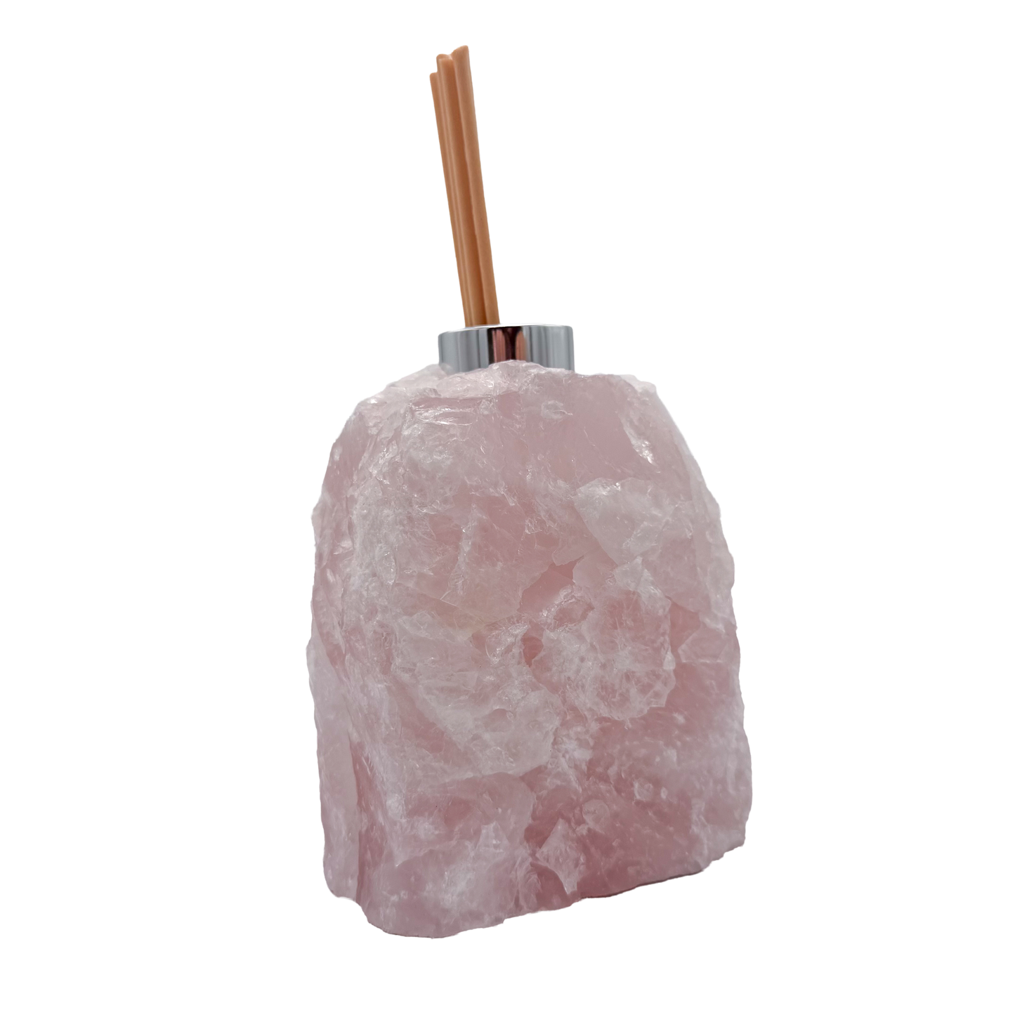 Rose quartz reed diffuser with deeper pink banding across the natural face