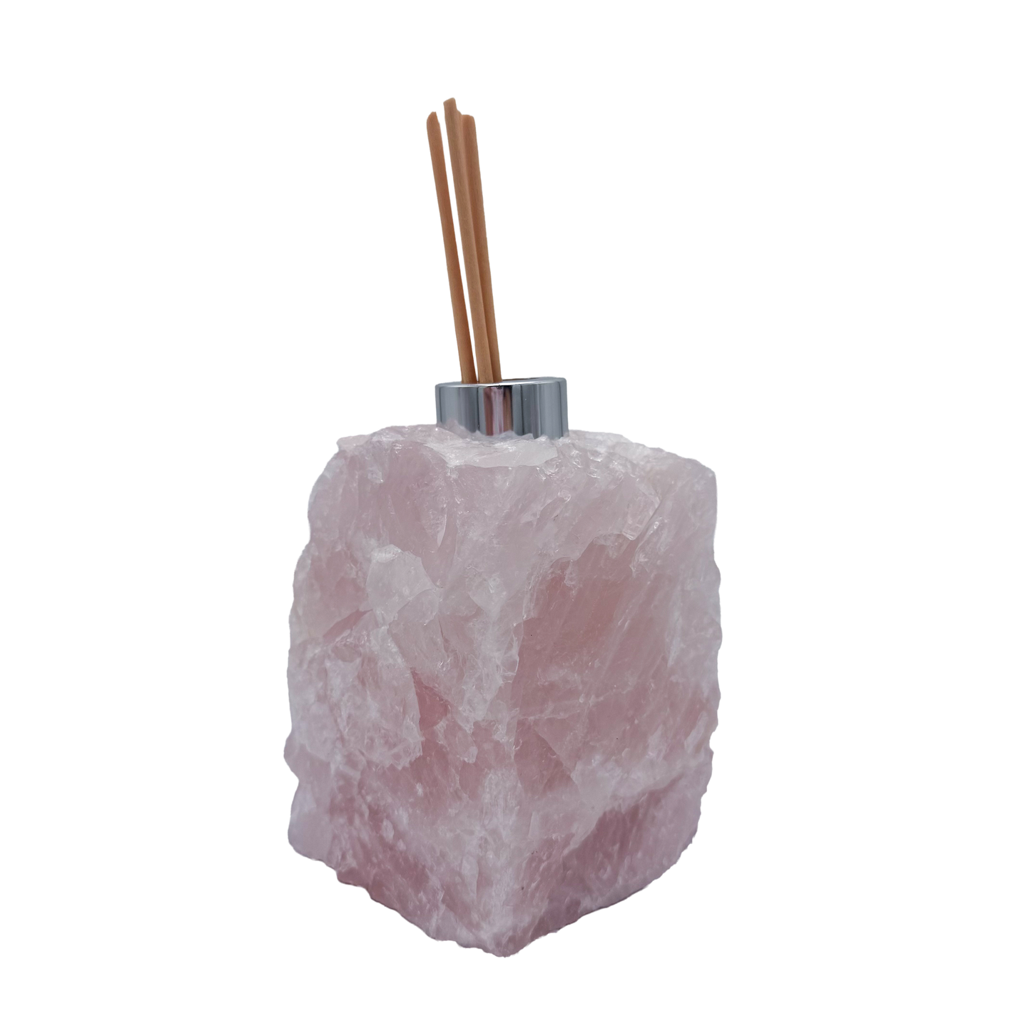 Rose quartz reed oil diffuser rear view with the chrome collar at the top