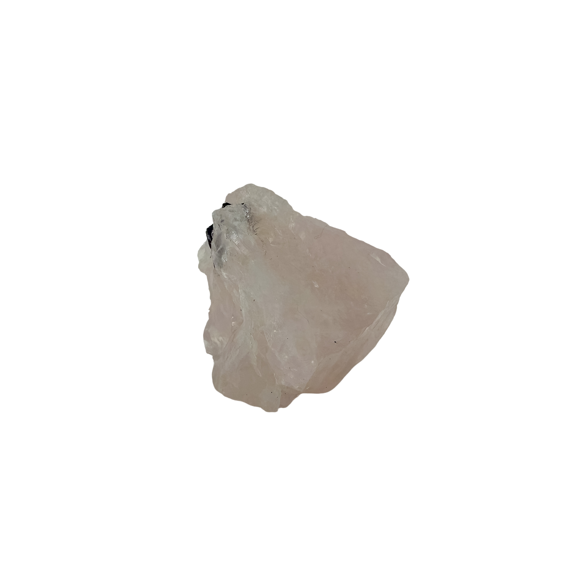 Detail of jet-black crystal against the pale pink of the upright pink block