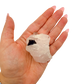 Hand holding the upright pink block to convey its real size, 1.88 inches