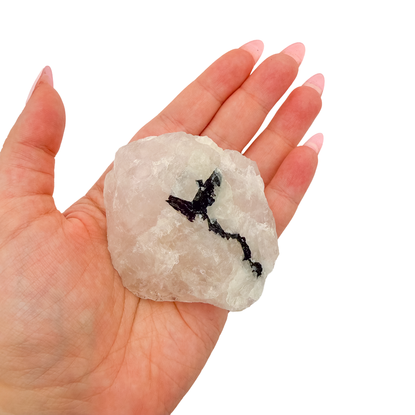 Scale shot of the classic pink form, 144 g of Minas Gerais rose quartz in a hand