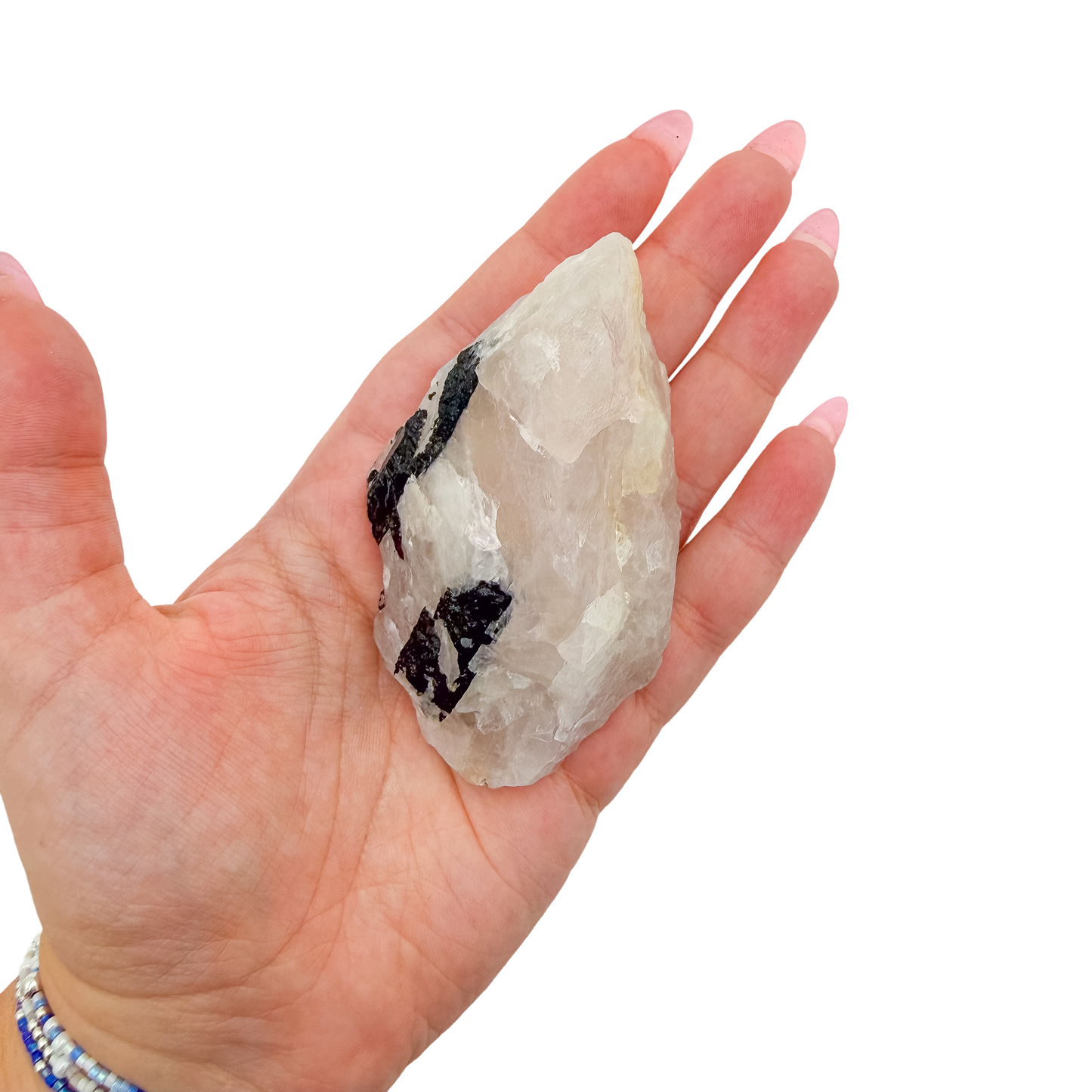 The long tourmaline vein held in a hand, showing the scale of this 3.30 inch specimen