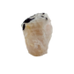 The elongated pink body tilted to catch light, 1.56 inches wide
