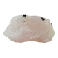 A 224 g pink quartz laced with dark tourmaline blades, the wide pink face