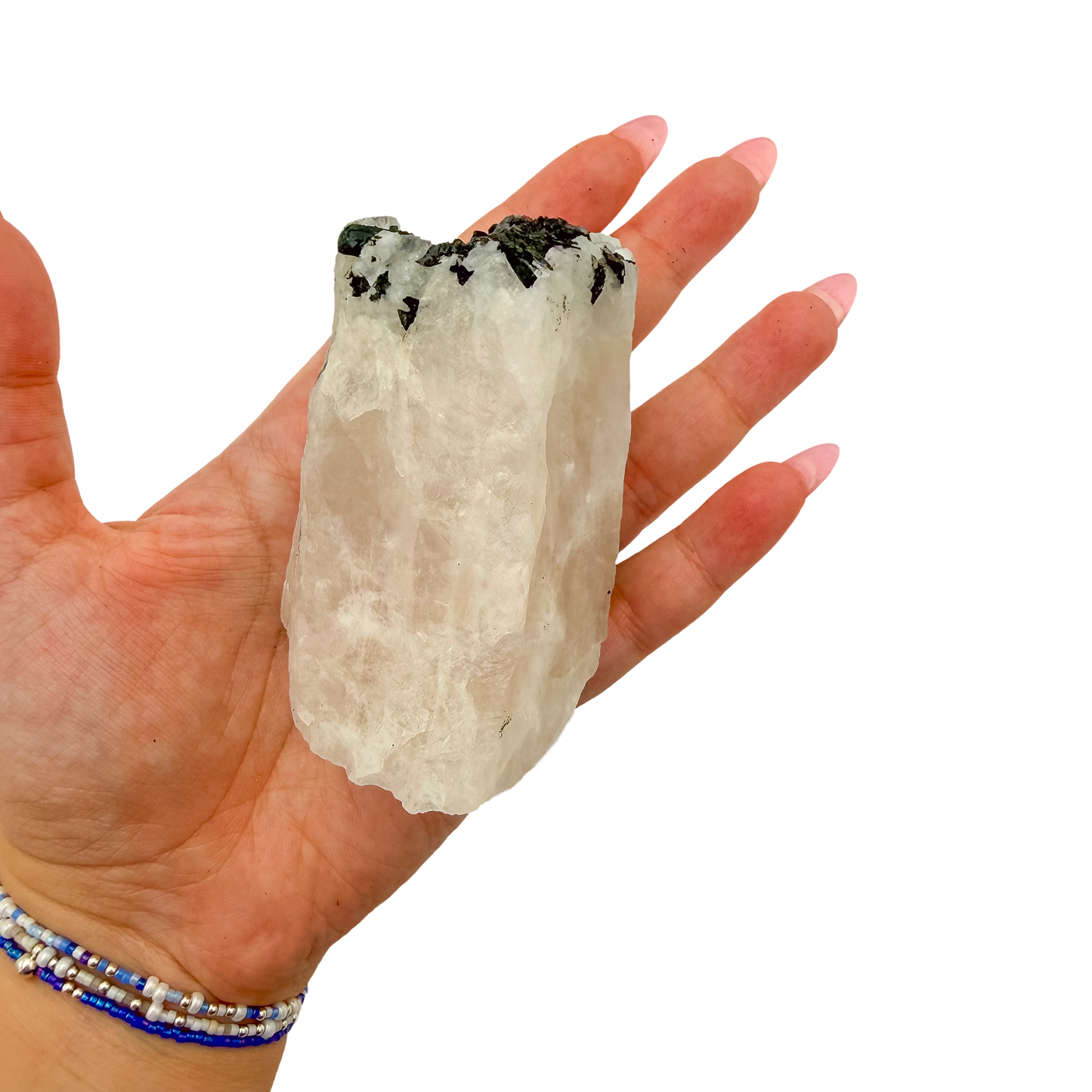 Hand holding the large pink block to convey its real size, 3.15 inches