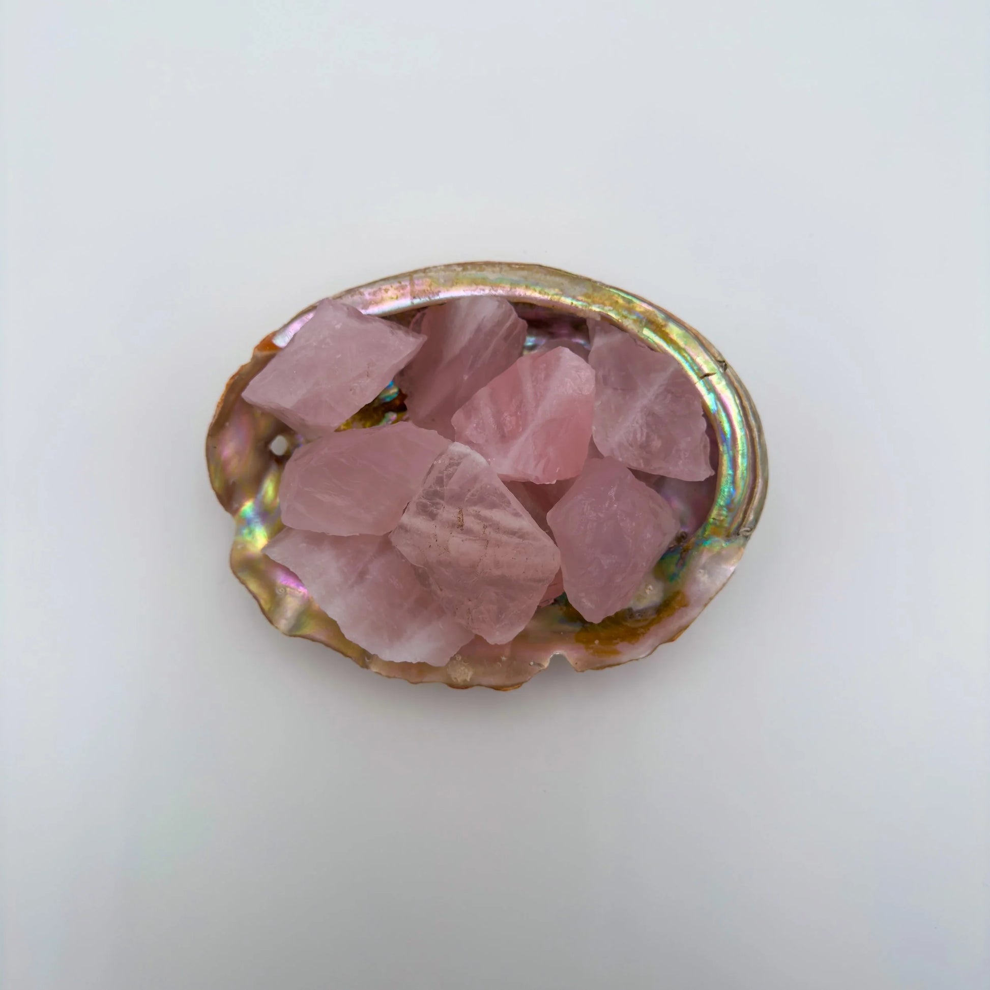 Close-up detail of Grade AA Rose Quartz raw showing natural pink tones and texture