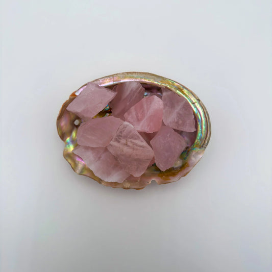 Close-up detail of Grade AA Rose Quartz raw showing natural pink tones and texture
