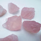 Back view of Grade AA Rose Quartz raw showing natural surface