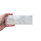 A Selenite polished stick held up against daylight, AAA grade, from New Mexico