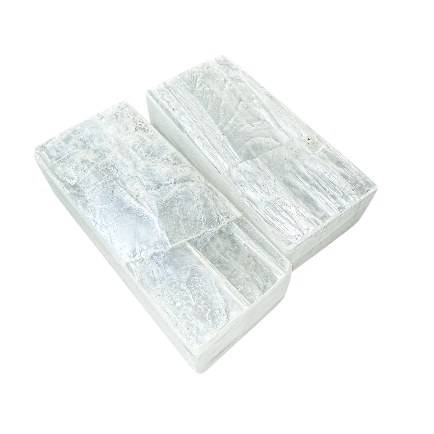 Two Selenite bars offset to show the polished face against the sawn edge