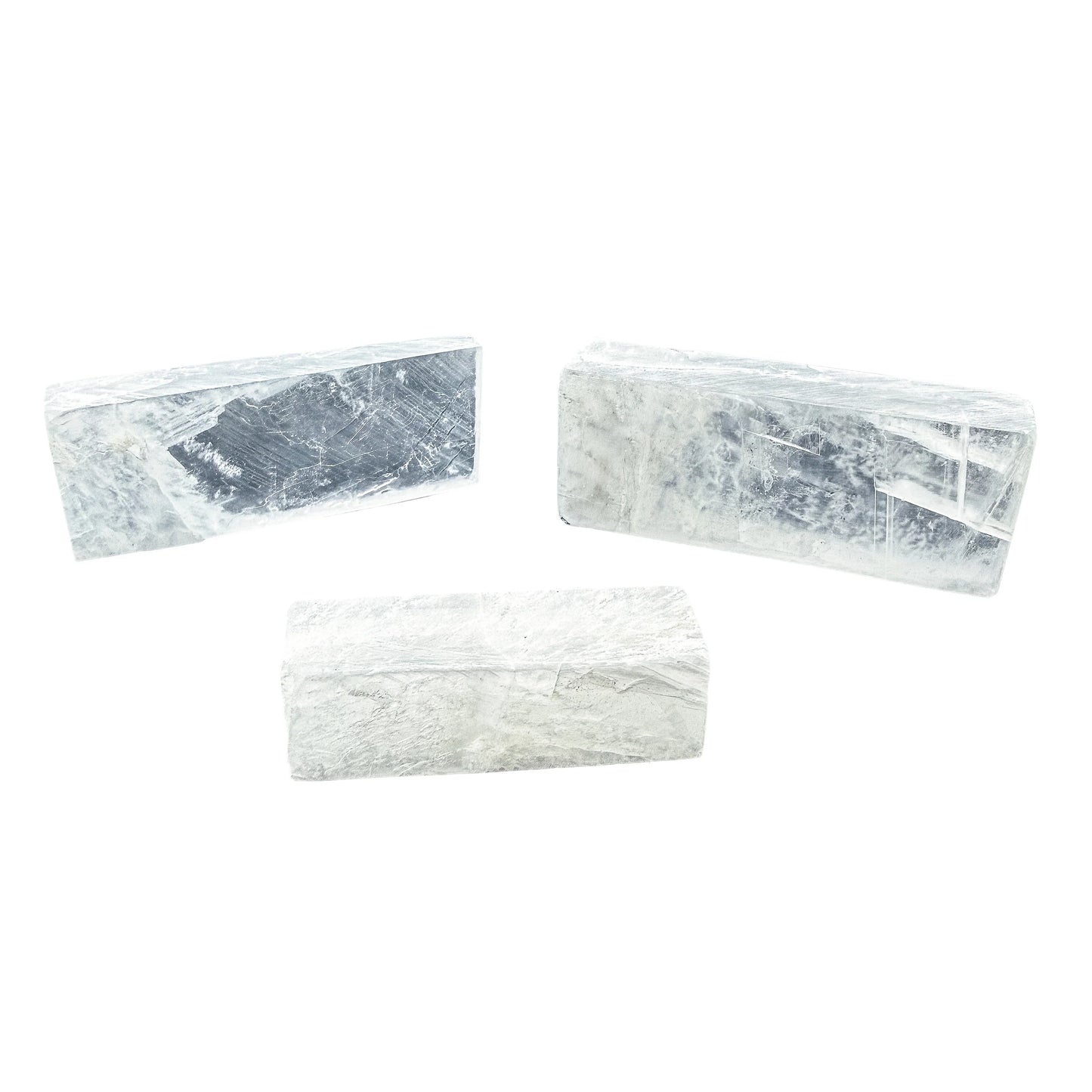 Selenite bars in daylight showing the pearly sheen across the polished face