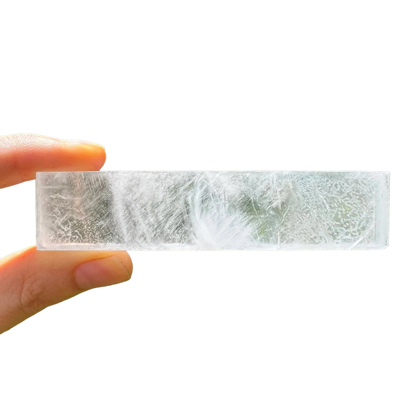 Side-on view of Selenite raw stone, traditionally used for Cleansing and Meditation, sourced from New Mexico, USA.
