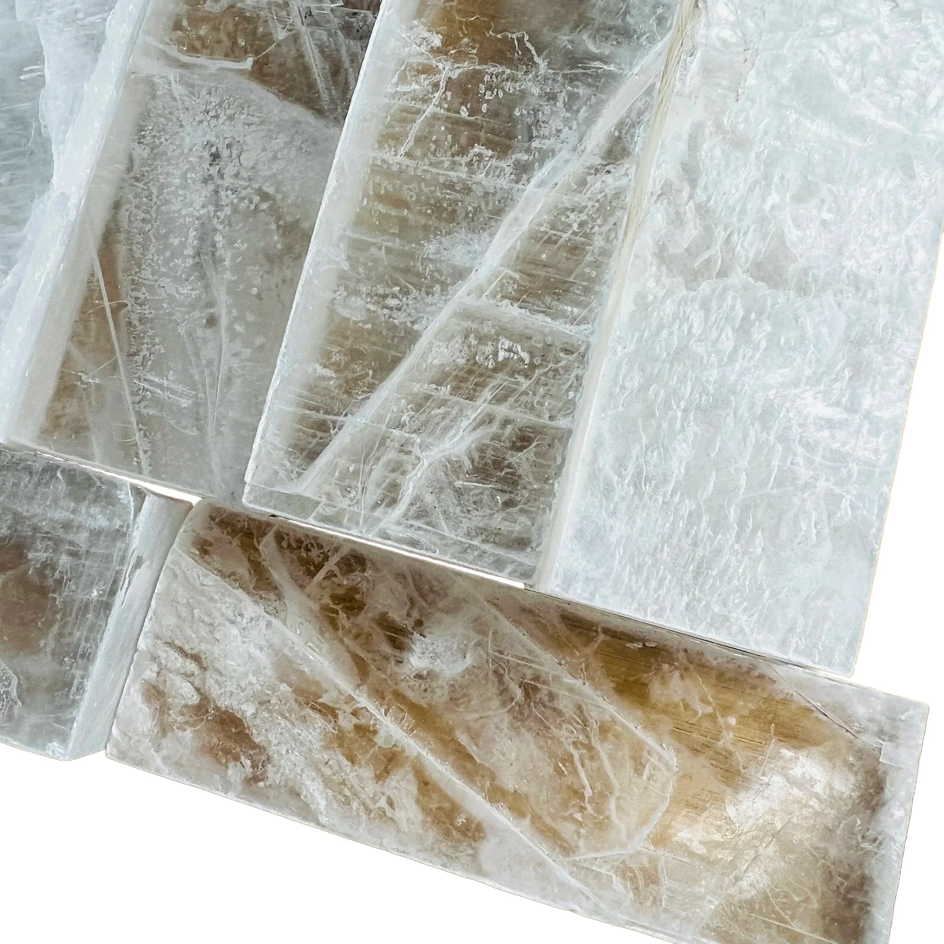 Detail shot of Grade AAA Selenite raw crystals under natural light