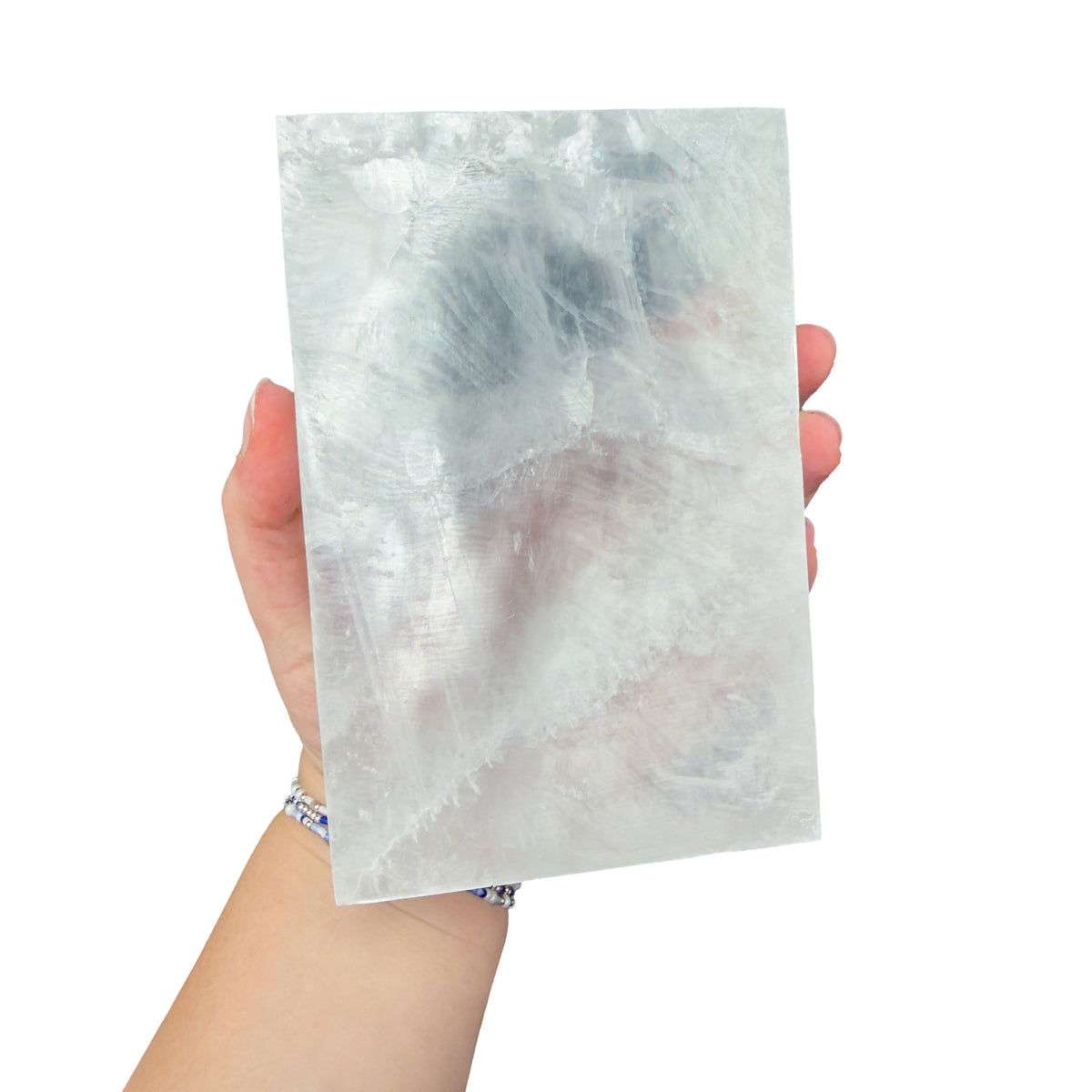AAA grade selenite clearing block from New Mexico, detail of the fibrous surface, translucent white gypsum fiber, specimen 65.